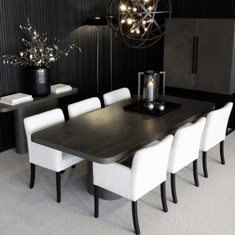 Dining table with rounded edges and base in dark grey