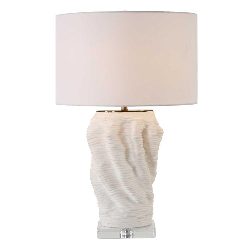 Cream lamp with mesmerising organic shaped base and cream shade.