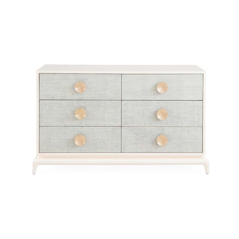 A six drawer dresser with light blue raffia drawer fronts and an ivory lacquered mahogany frame.