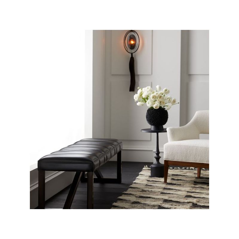 Black matte end table with contemporary curved base