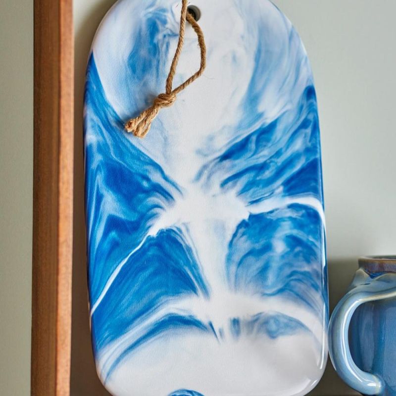 Stone cutting board in white and blue sea like design