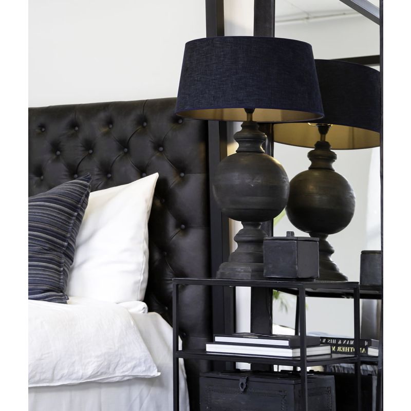 Curvaceous table lamp with rustic black finish