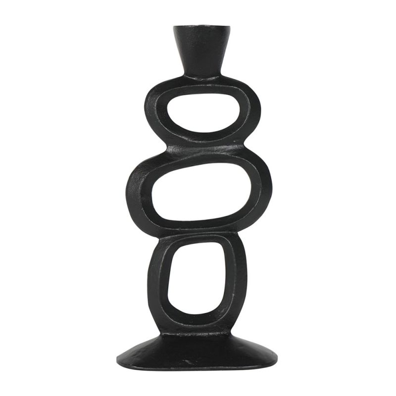 organic shapes stacked to create a curvaceous candle holder