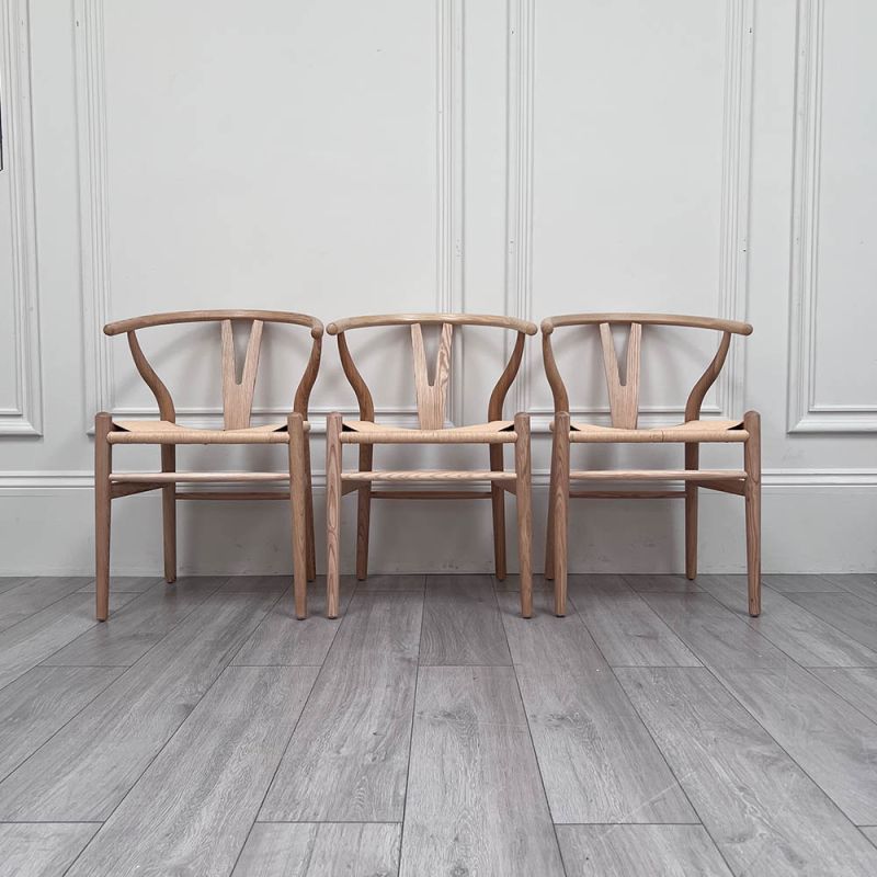 Set of three natural birch wishbone dining chairs