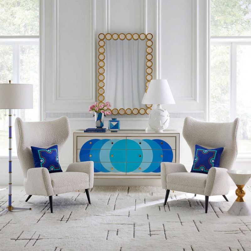 White console table with blue circle pattern