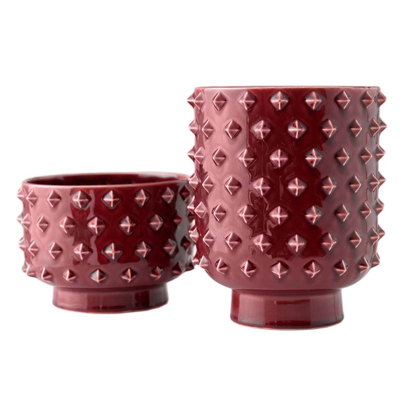 Set of two red vases with geometric spike details