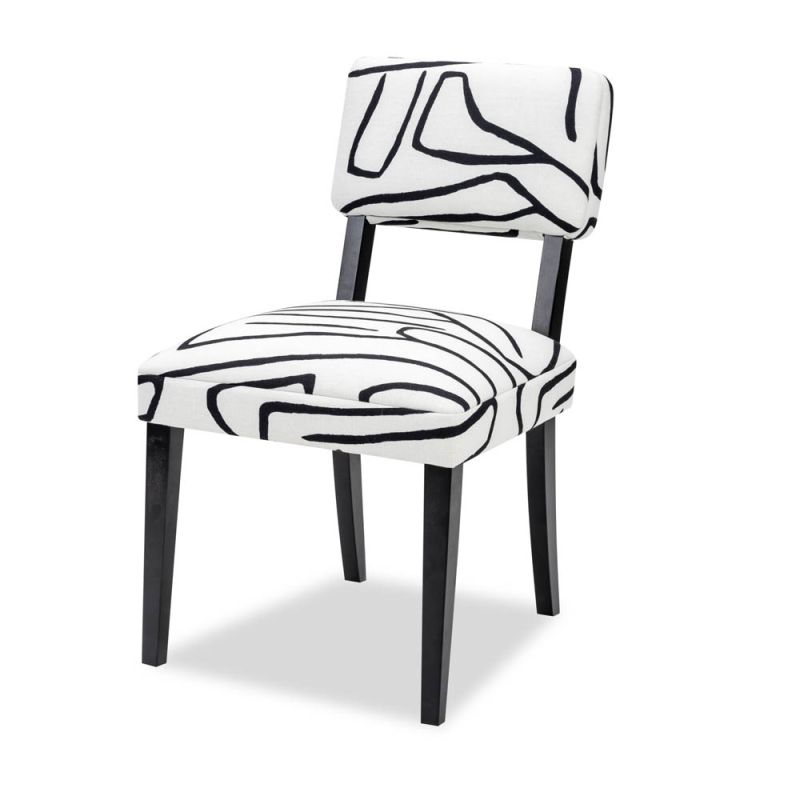 Black and white dining chair upholstered in modern graphic printed fabric