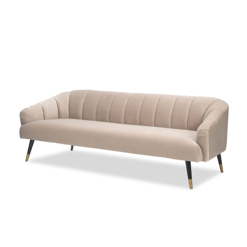 A stylish sofa by Liang & Eimil with a lovely soft velvet upholstery