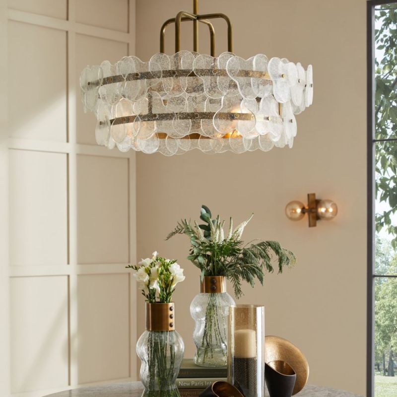 Gold framed chandelier with glass flower details