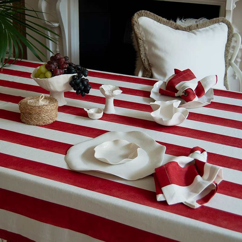 Tablecloth with colourful stripe design and ruffled edges