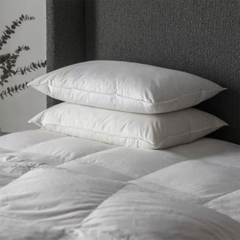 Sumptuous pillow filled with 80/20 White Goose Feather and Down and boasts a soft 210 thread count 100% cotton percale piped case