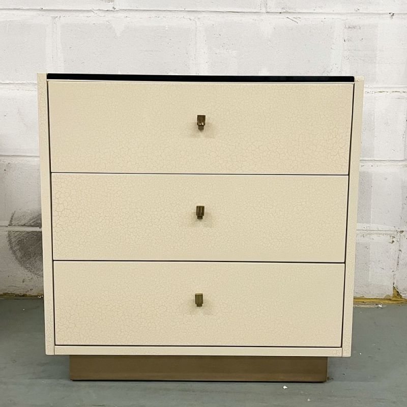 Ivory coloured three drawer bedside table with chocolate coloured details