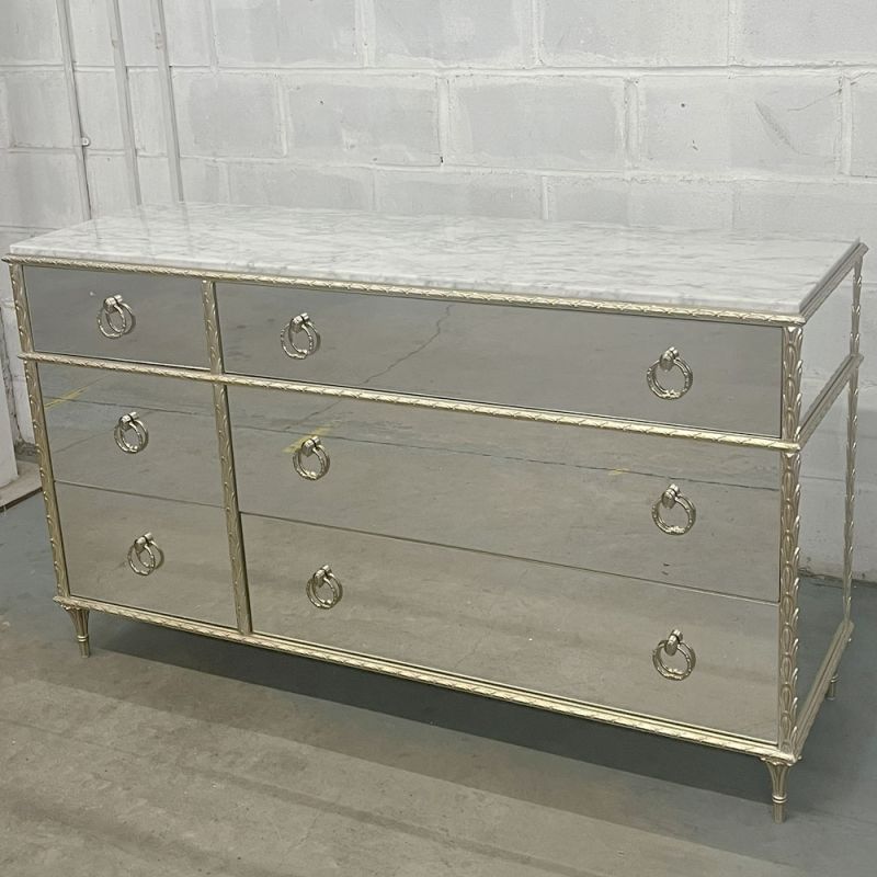 Large mirrored chest of doors with marble top and ornate detailing