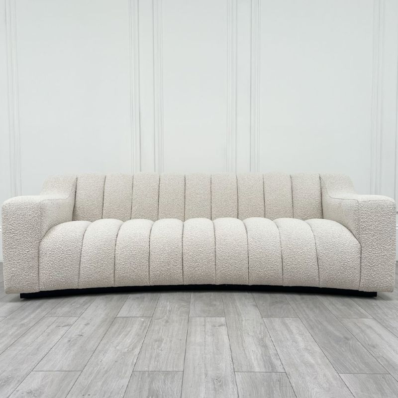 Cream Boucle sofa with deep ridging and minor marks to the upholstery
