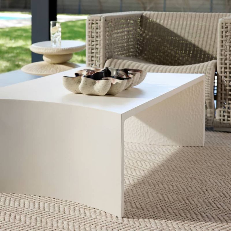 Elevate your outdoor space with the Haney Outdoor Cocktail Table. Stylish, durable, and perfect for entertaining guests in any setting.