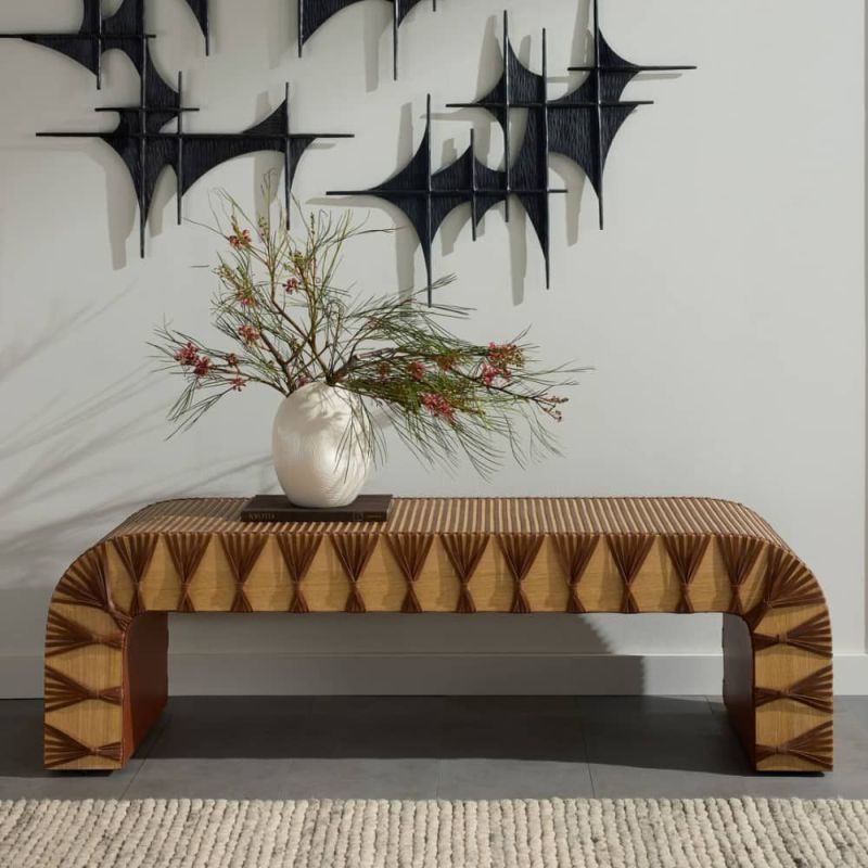 Curved wooden bench with strands of woven leather