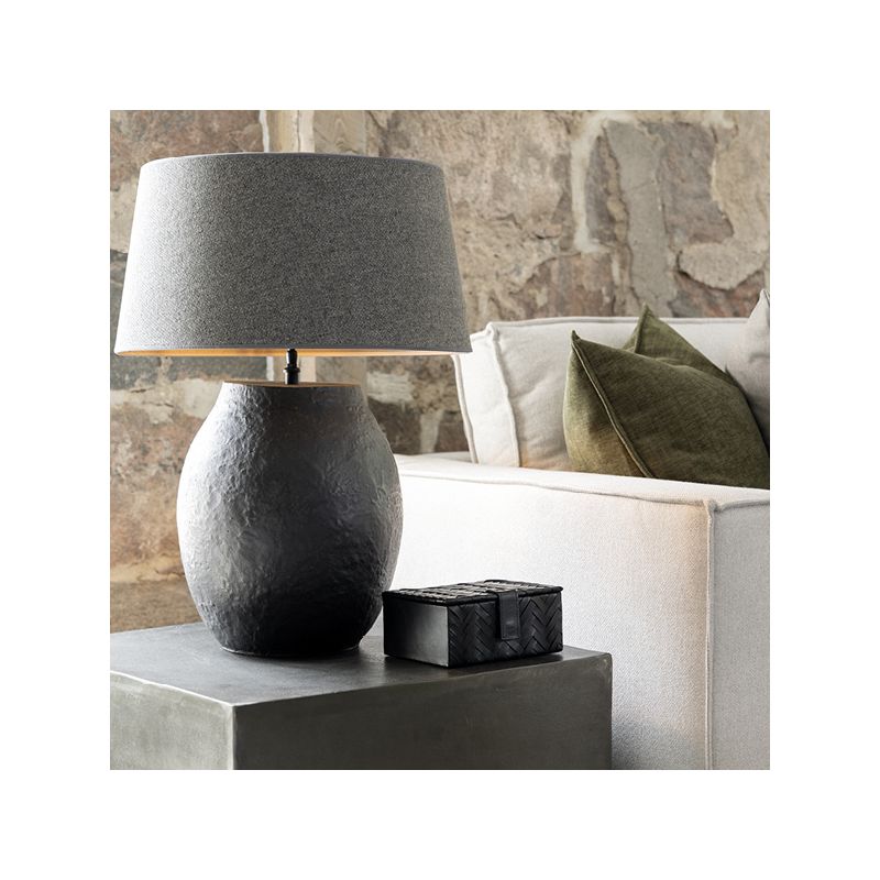 Large black metal table lamp with organic textured finish, shade not included