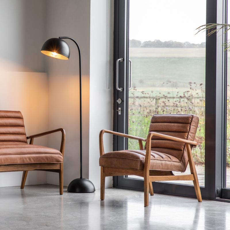 Leather armchair with deep ridging and wooden frame