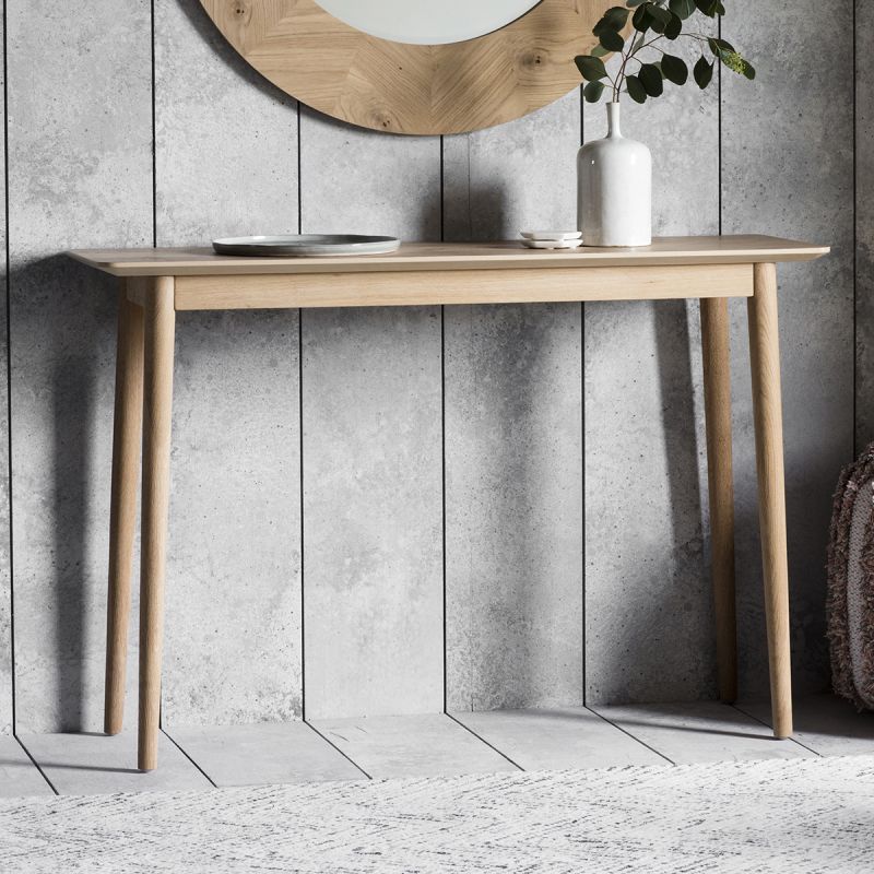 Warm wooden console table with chevron design