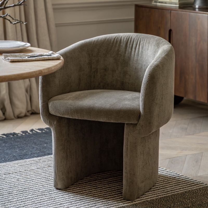 Tub-shaped dining chair with beige cord fabric