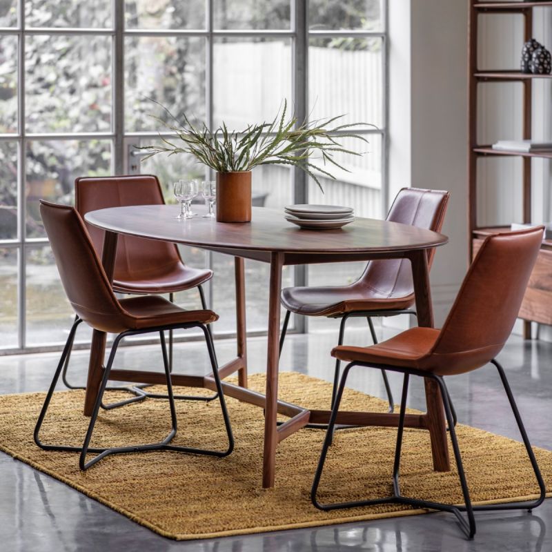 Wooden oval dining table in walnut finish