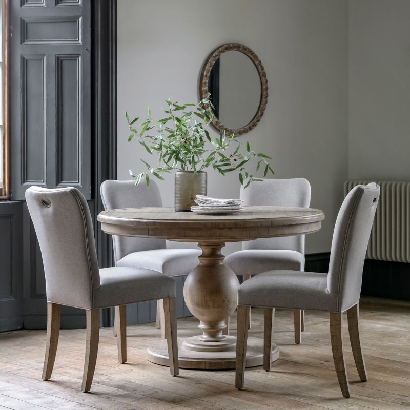 Rustic and sophisticated dining table with detailed base