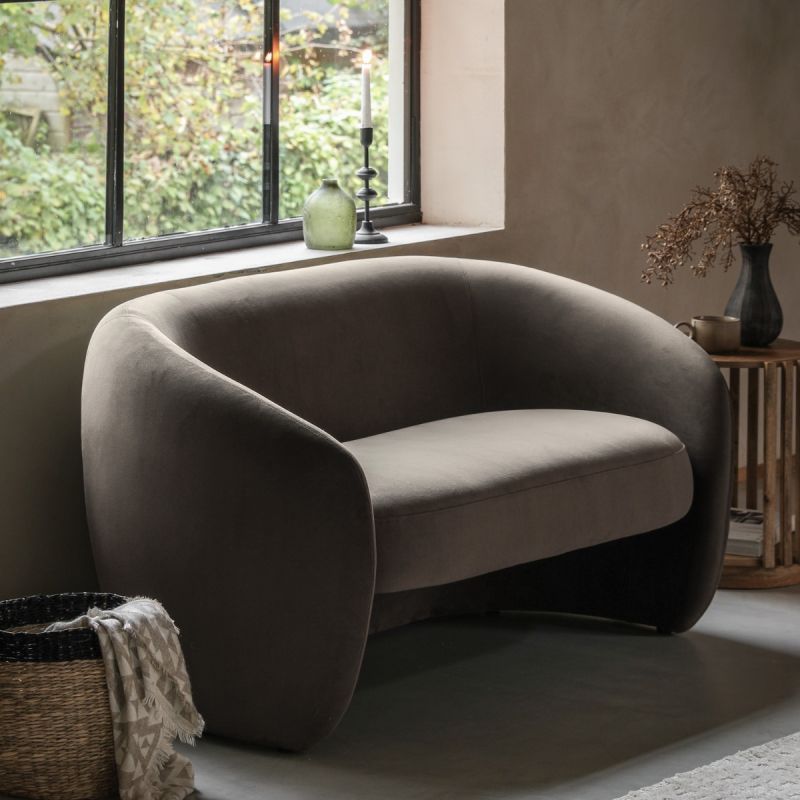 Curved sofa with smooth brown finish