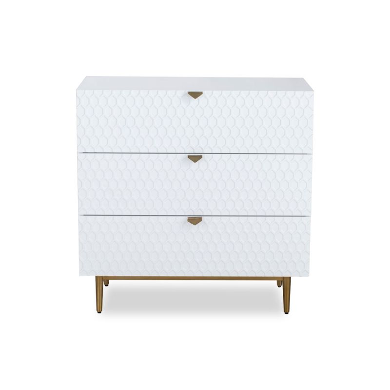 White chest of drawers with hexagon print and brass legs