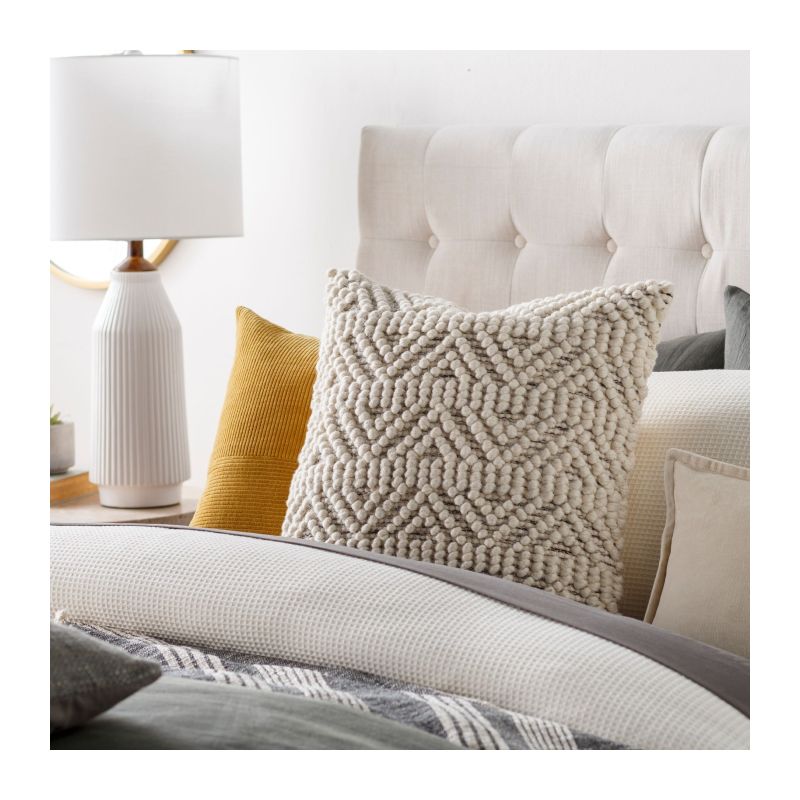 Elevate your space with our Hygge Hand Woven Cushion. Soft, cosy, and stylish, it's perfect for adding warmth and comfort to any room.