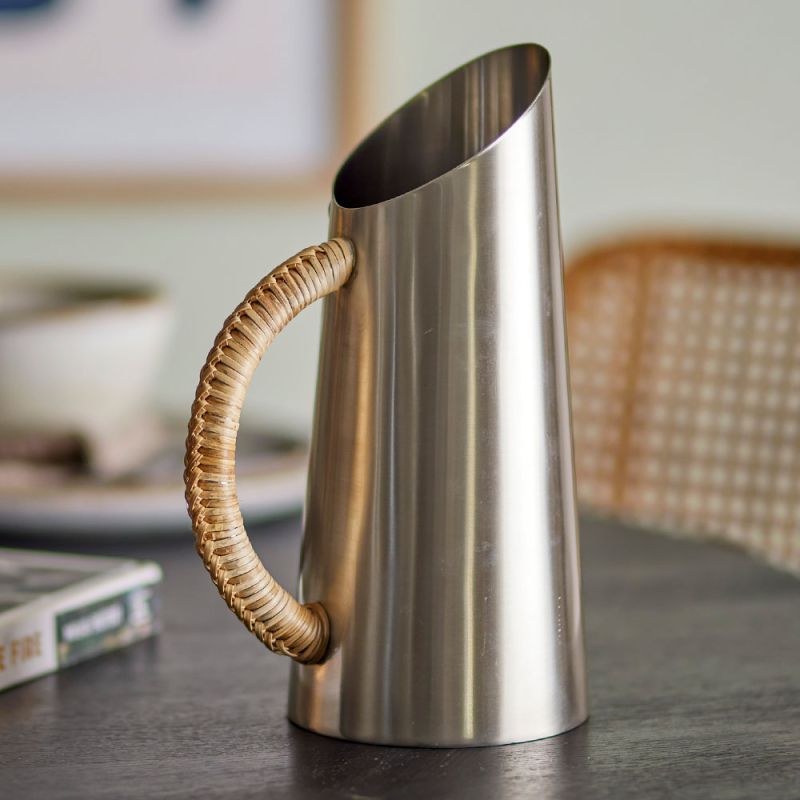 Sleek Stainless Steel jug with a rattan handle