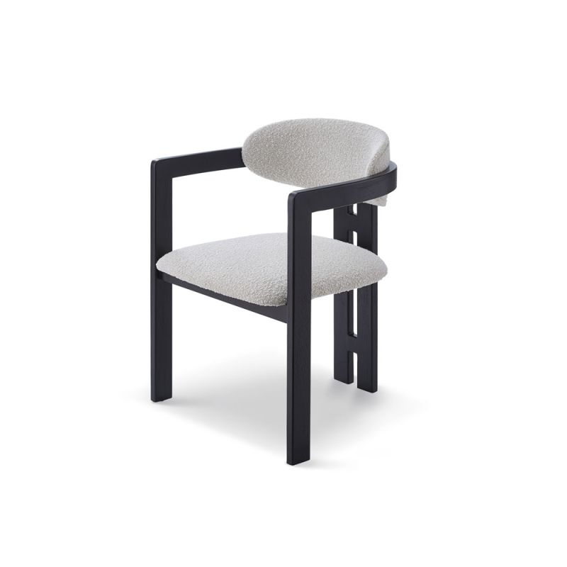 dining chair with Boucle upholstered backrest and seat and black legs and arm rests