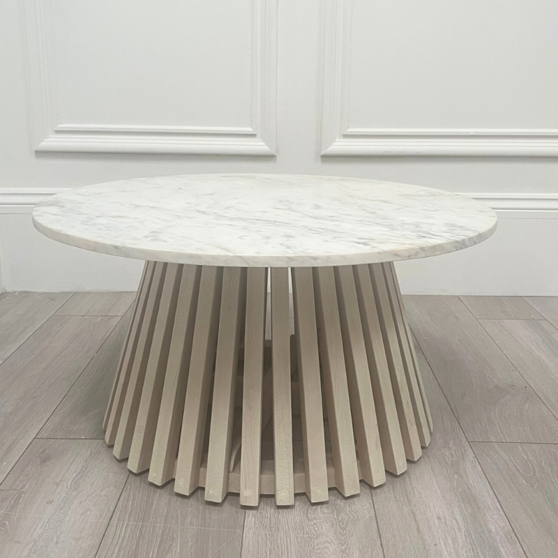 Marble top coffee table with gentle sloping slats for base