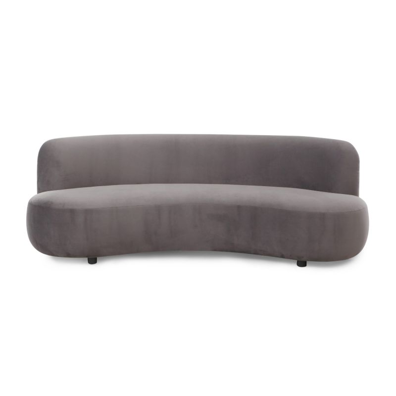 A sumptuous sofa by Liang & Eimil with a curved design and luxury grey velvet upholstery