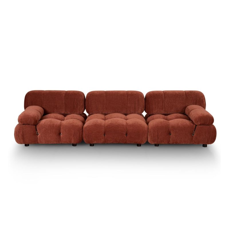 A statement sofa by Liang & Eimil with a modular design and soft red upholstery