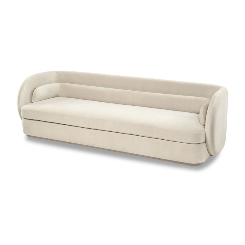 A contemporary sofa with a curvaceous design and luxury velvet upholstery