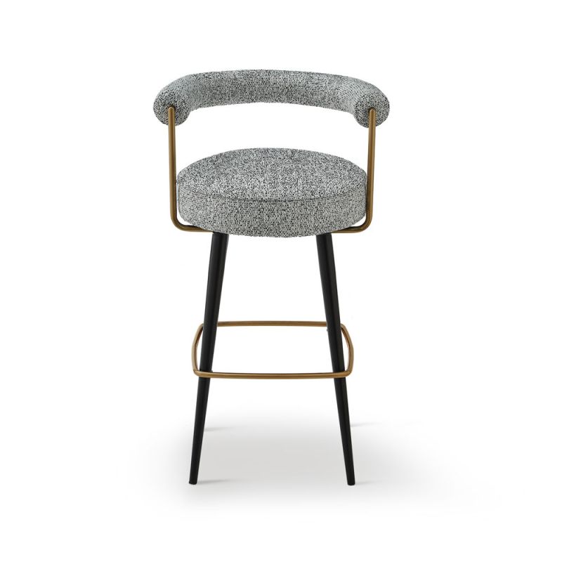 Chic upholstered bar stool with black legs and brass accents