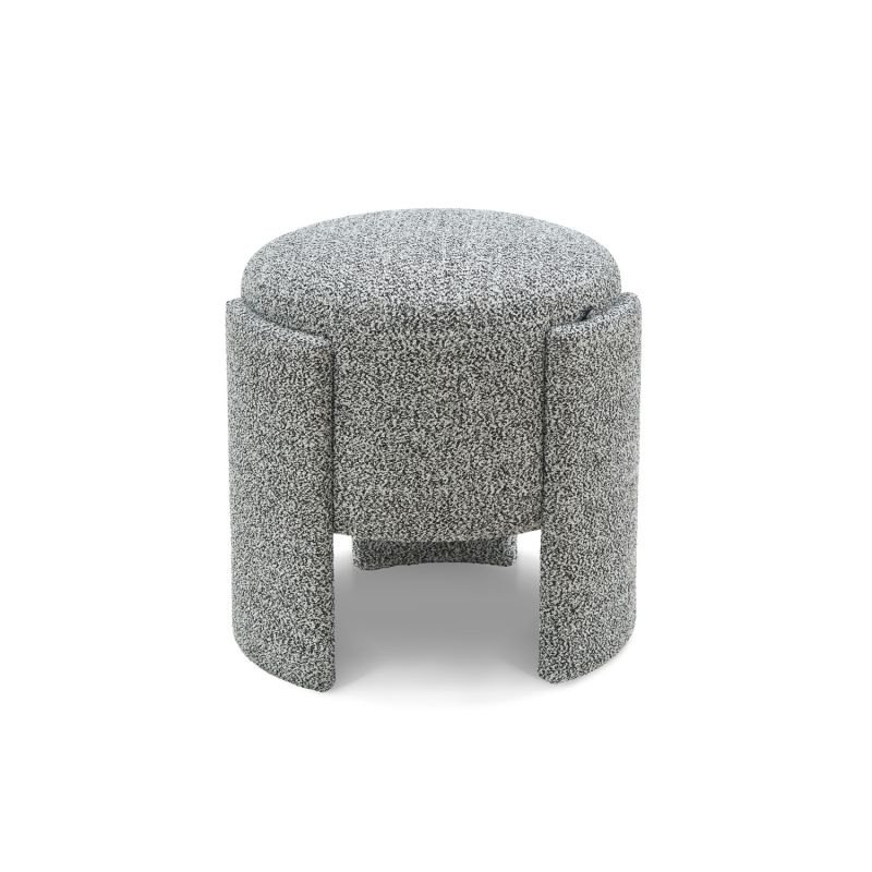 Small round stool upholstered in speckle grey fabric with wide legs overlapping the seat