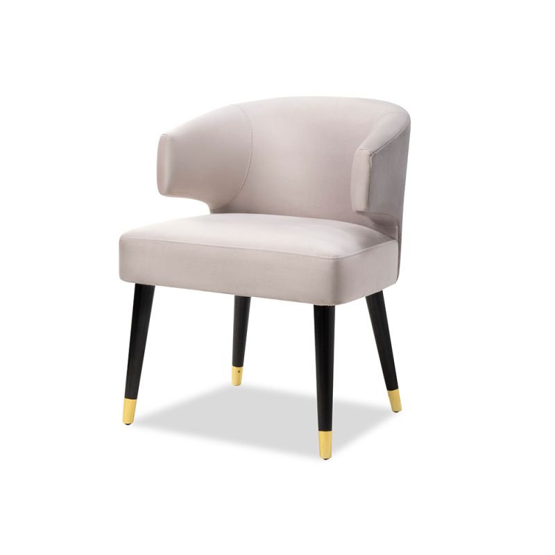 A luxury dining chair by Liang & Eimil with a sophisticated grey upholstery