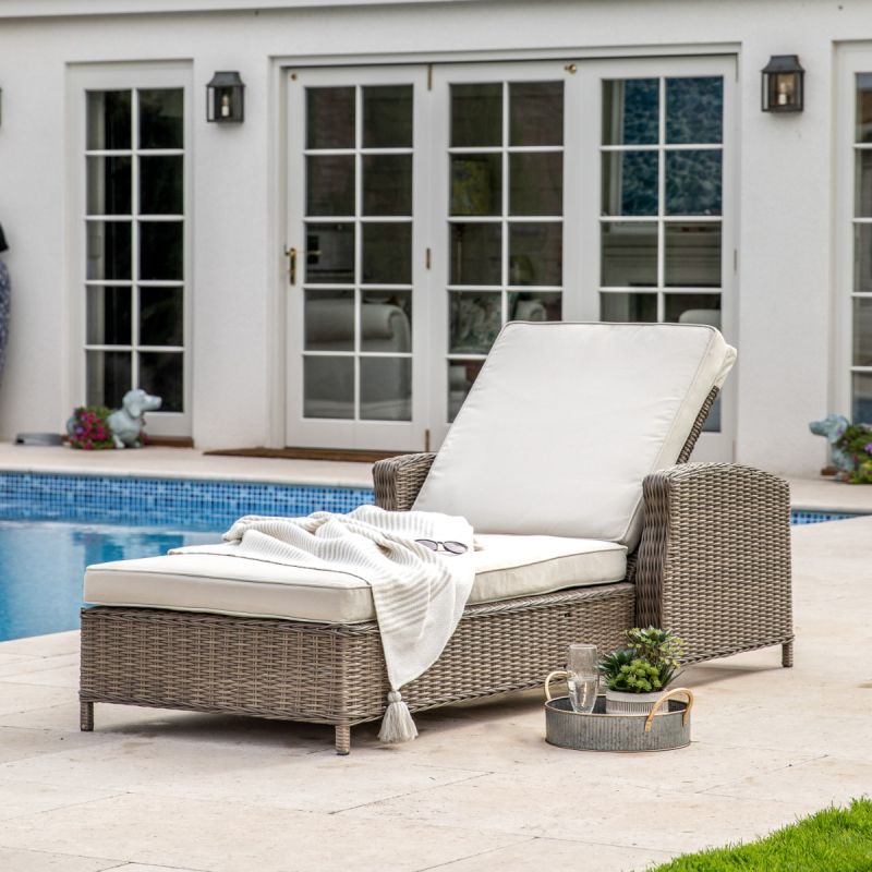 Sunlounger crafted from rattan with a hand woven mixed half round/full round weave in a natural finish