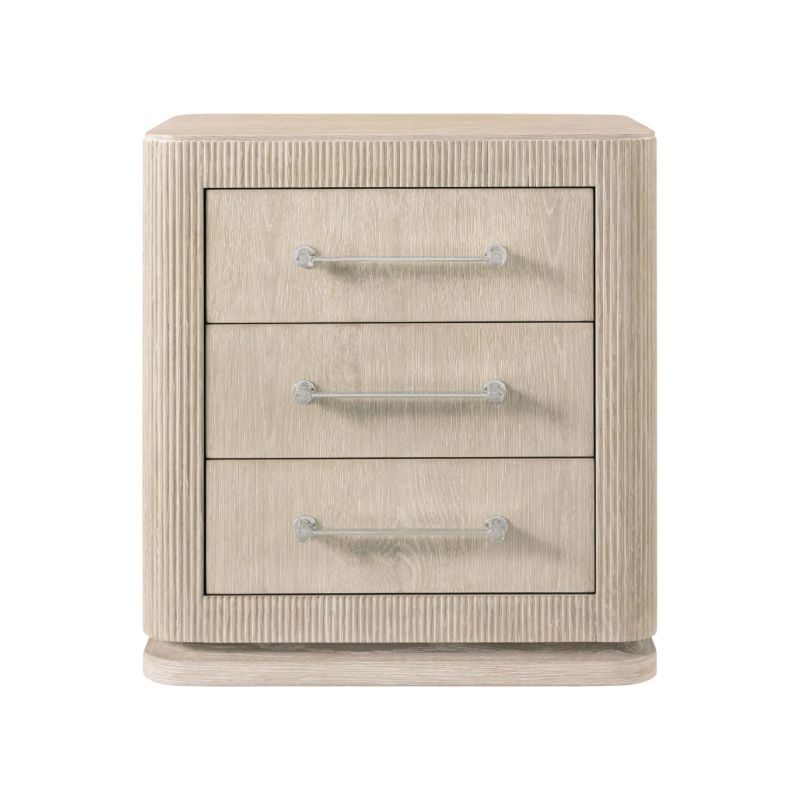 Light wood bedside table with three drawers and sleek handles