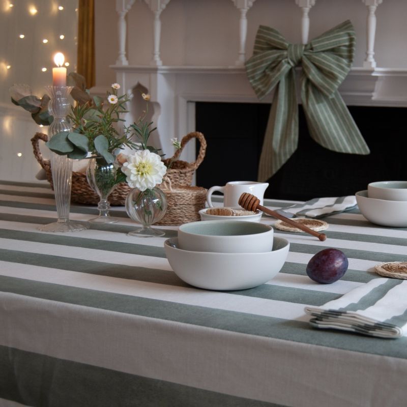 Tablecloth with colourful stripe design and ruffled edges