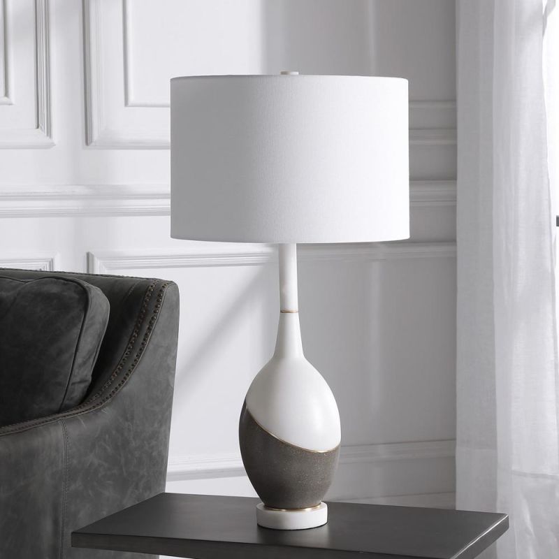 Black and white table lamp with gold detailing