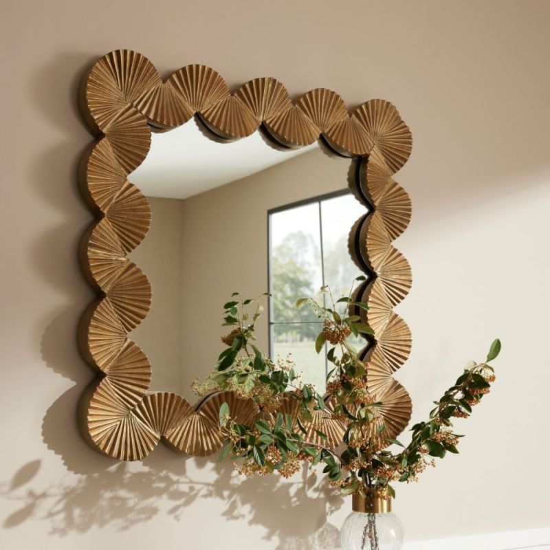 Square mirror with a thick gold scalloped frame