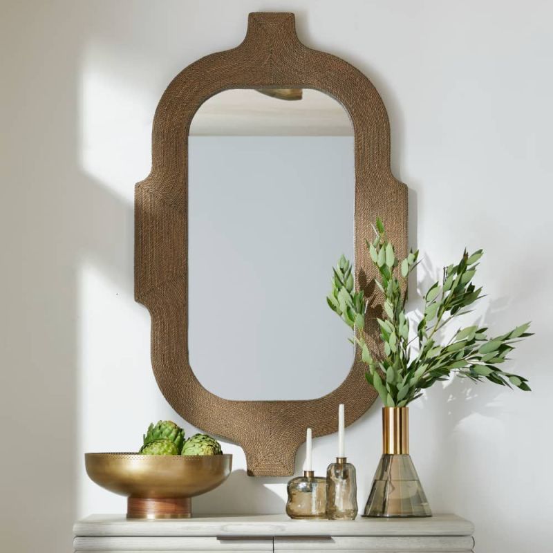 The Freeport Mirror pairs Indian-inspired architecture with tobacco-stained abaca rope for a rustic yet refined look.