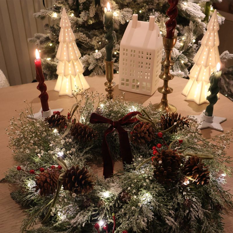 Beautiful pinecone decoration with sage bow