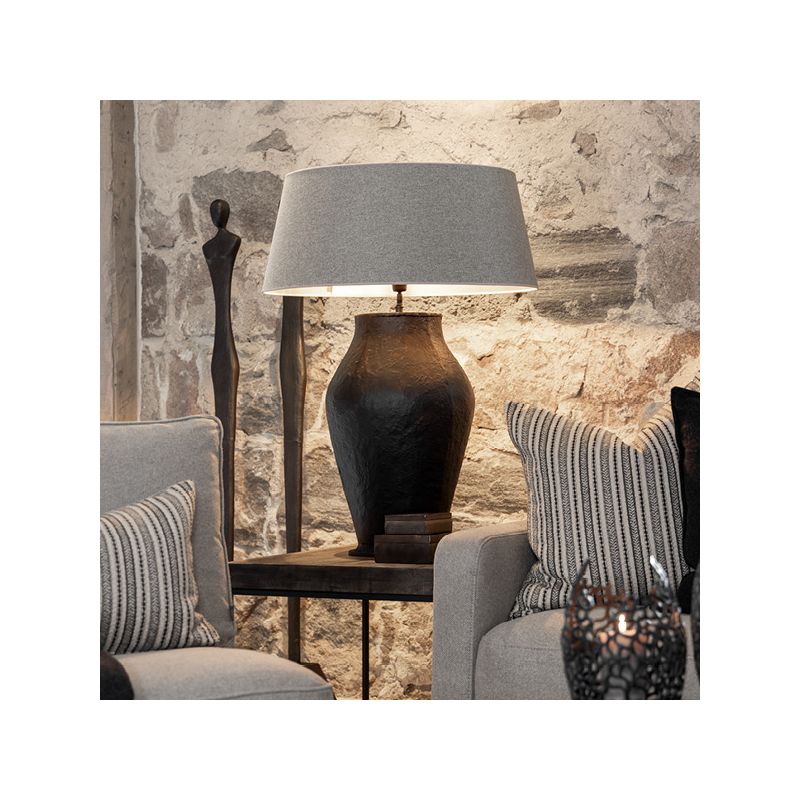 Large black metal table lamp with organic textured finish, shade not included