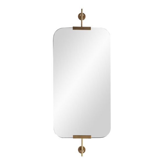 Wall mirror with rounded edges and brass wall fixtures at the top and bottom