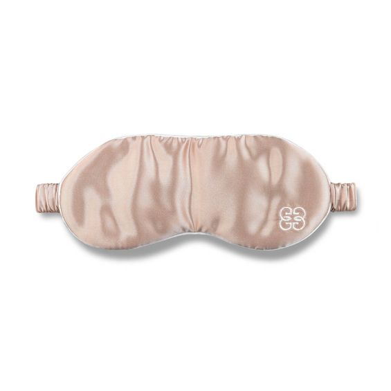 Blush pink silk eye mask with ivory piping detail