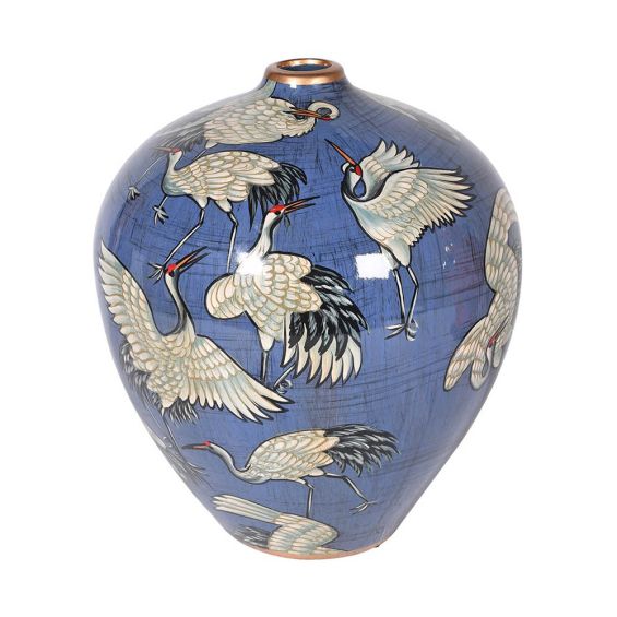 A gorgeous, ceramic vase with a stunning, bird-inspired illustration 