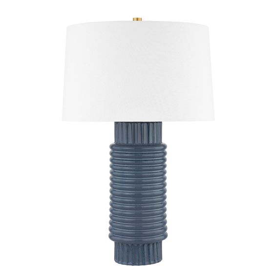 Blue ceramic side lamp with white shade and gold accents